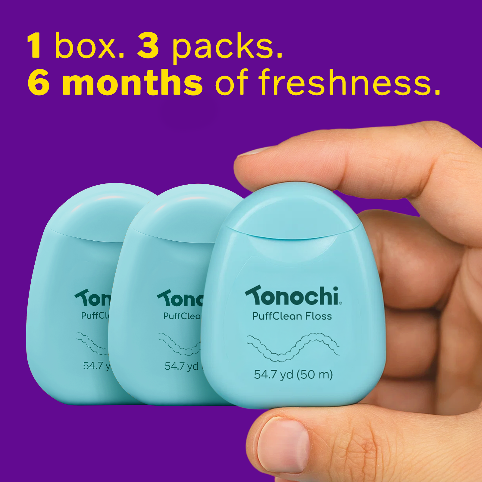 Three packs of Tonochi PuffClean Floss held in a hand, featuring