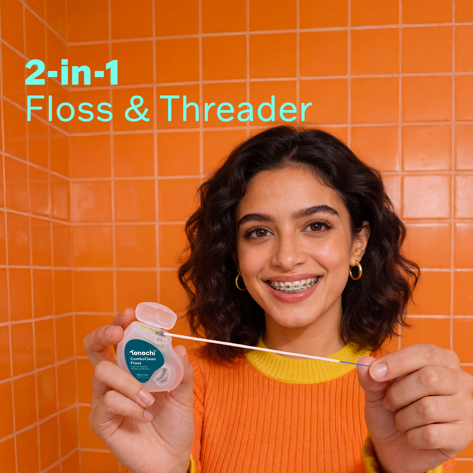 Woman pulling out floss from the Tonochi ComboClean container