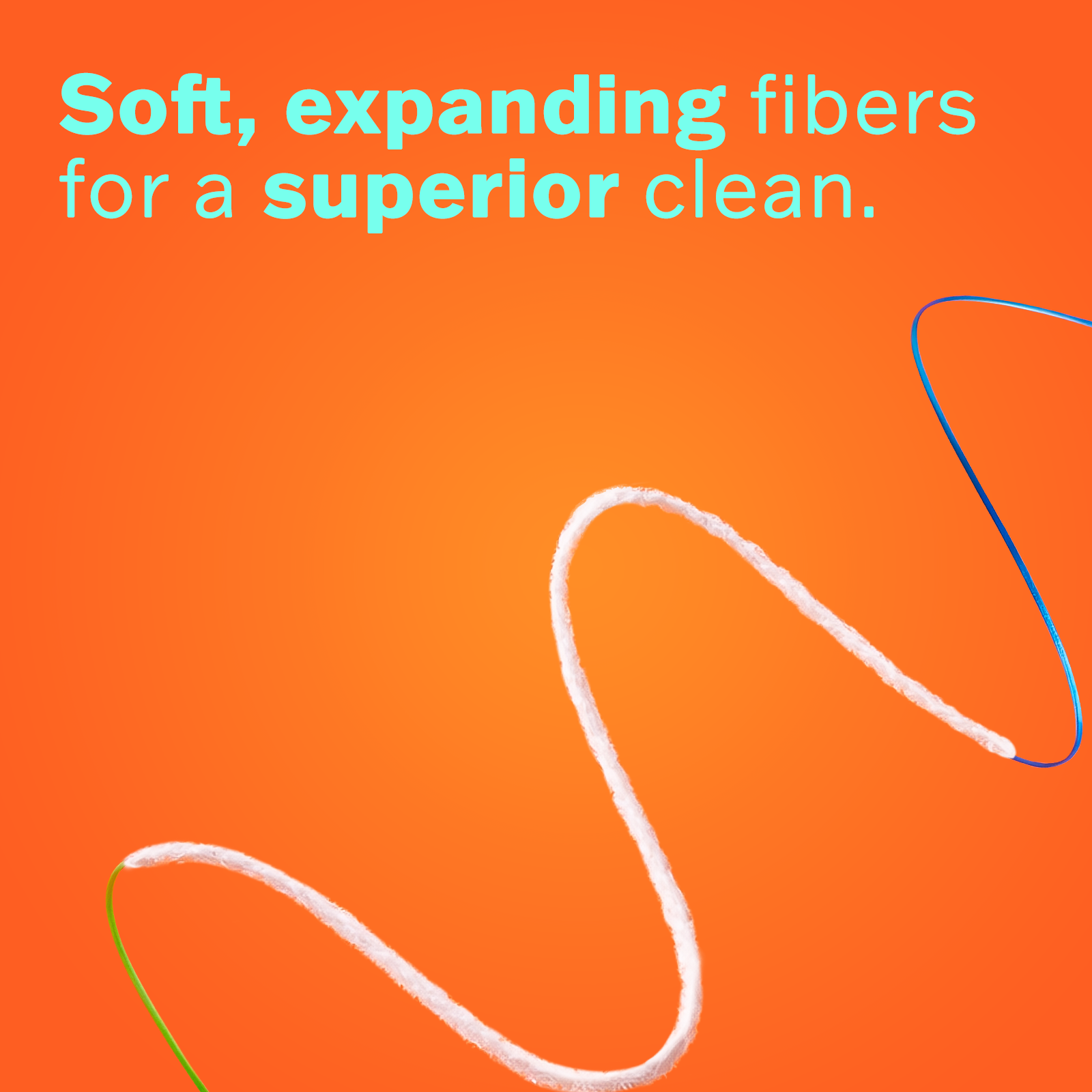 Macro view of soft, expanding dental floss fibers designed for deep plaque removal and superior cleaning.
