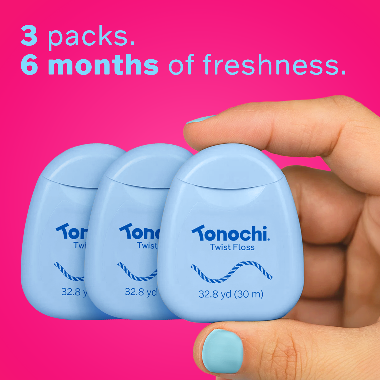 Three blue Tonochi Twist Floss dispensers held in a hand, providing 6 months of freshness for wider gaps.
