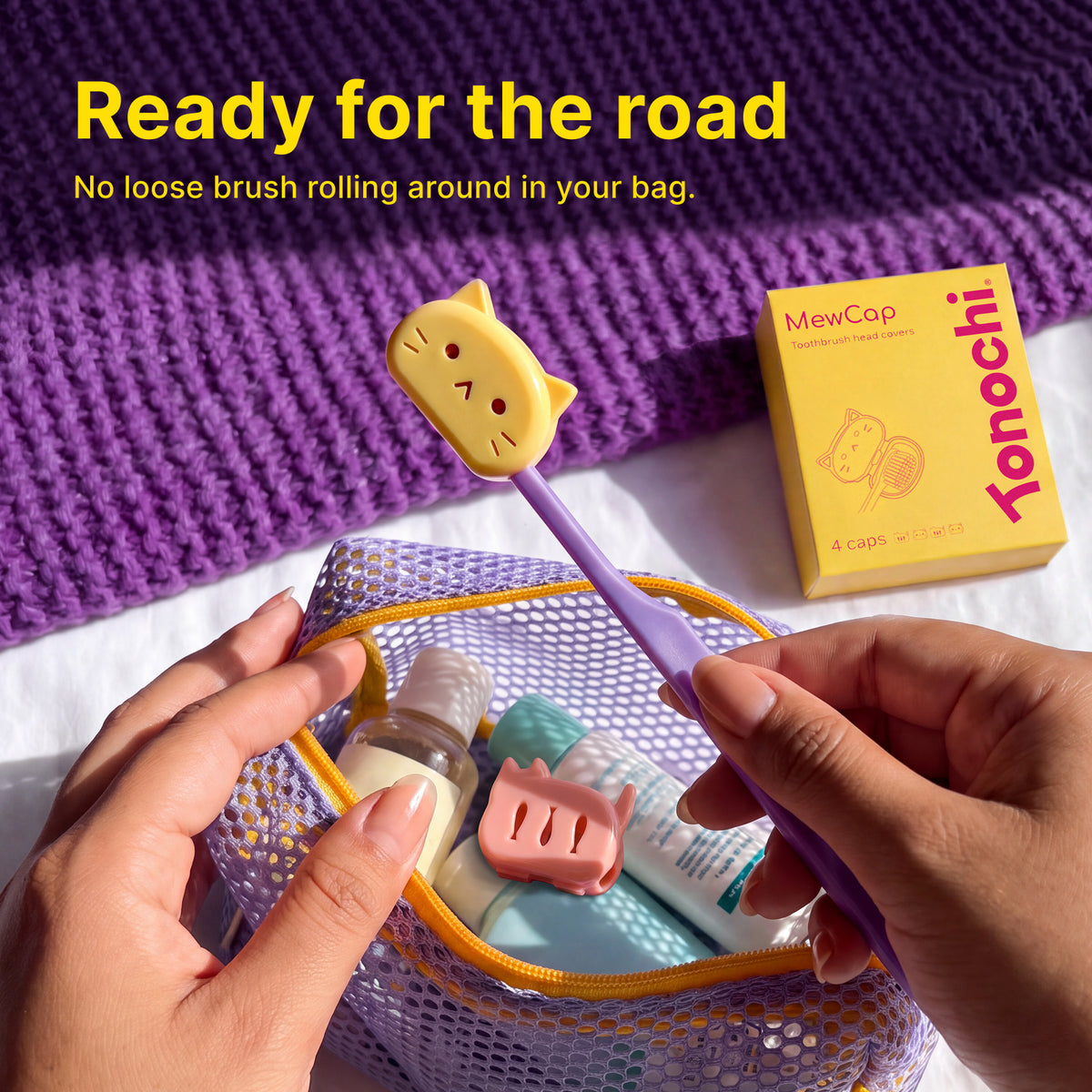 Mew Cap toothbrush cover and packaging beside a travel bag