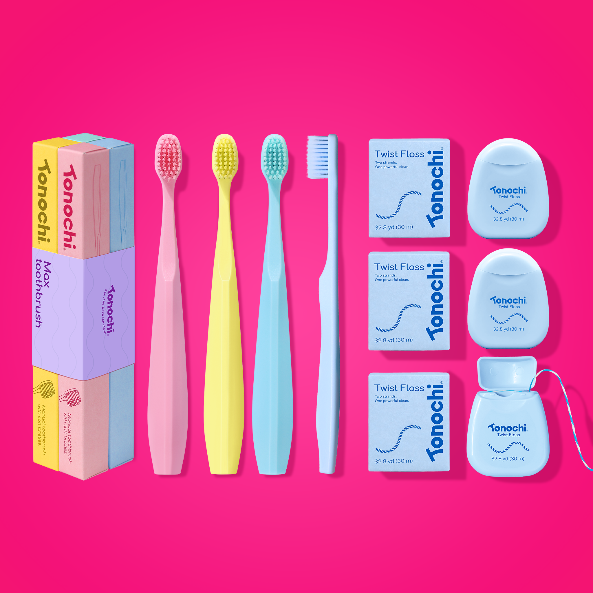 Set of colorful toothbrushes and dental care products on a pink background