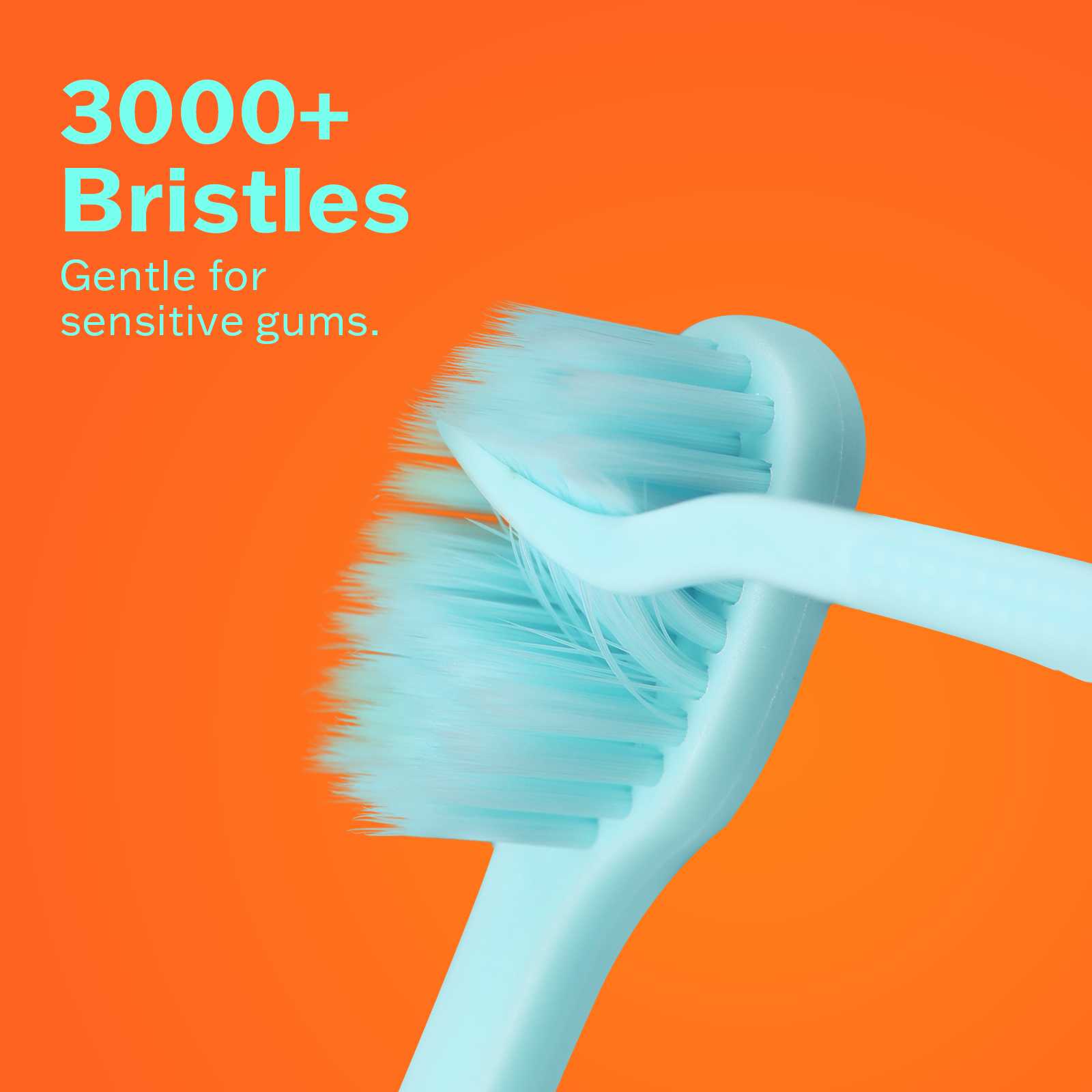 3000+ bristles toothbrush on a vibrant pink background, gentle for sensitive gums.