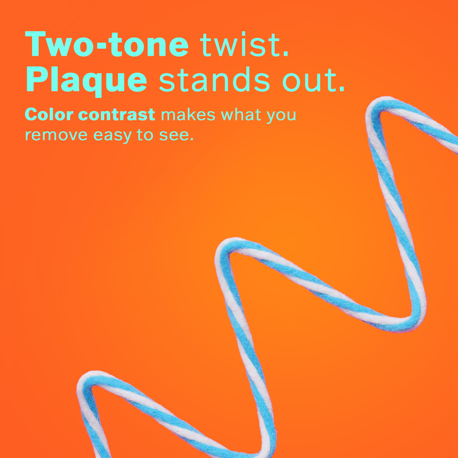 Two-tone twist and plaque stands out on a bright pink background, emphasizing color contrast for easy visibility.