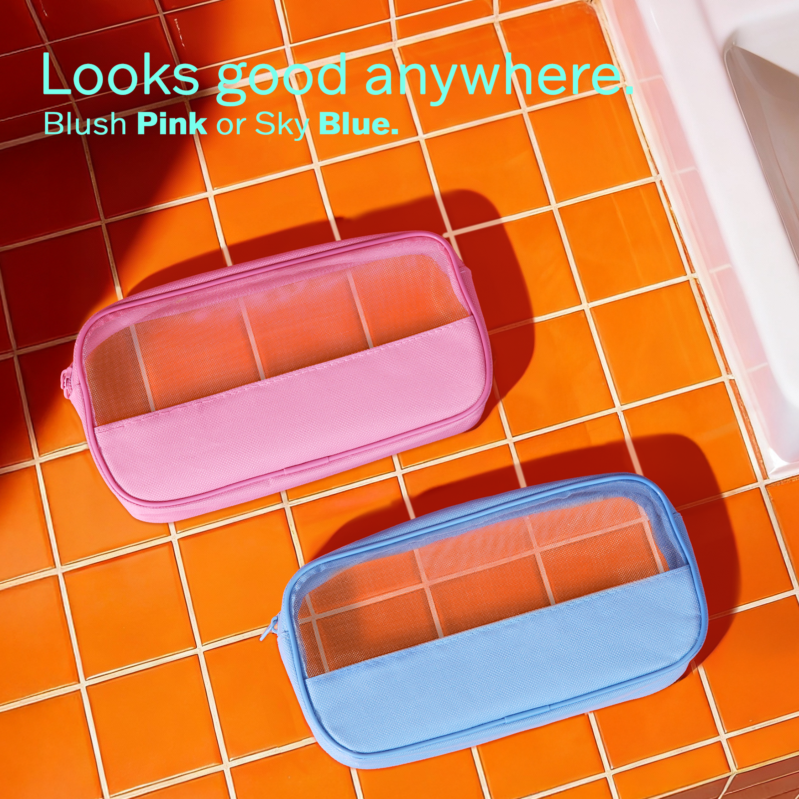 Pink and blue rectangular pouches on an orange tiled floor