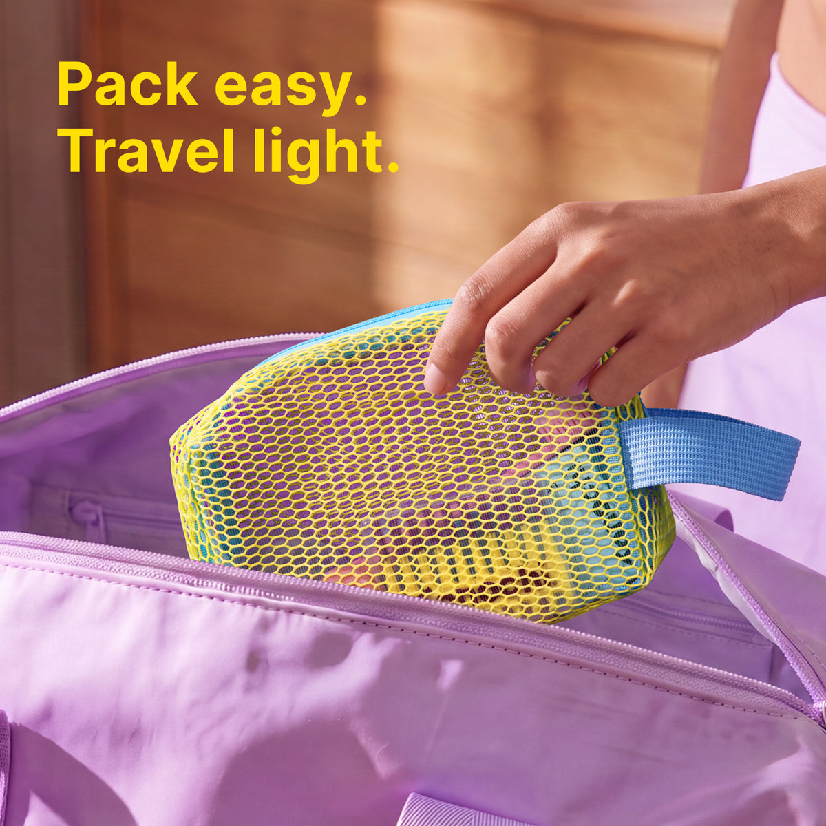 Lightweight mesh toiletry pouch packed inside a travel bag