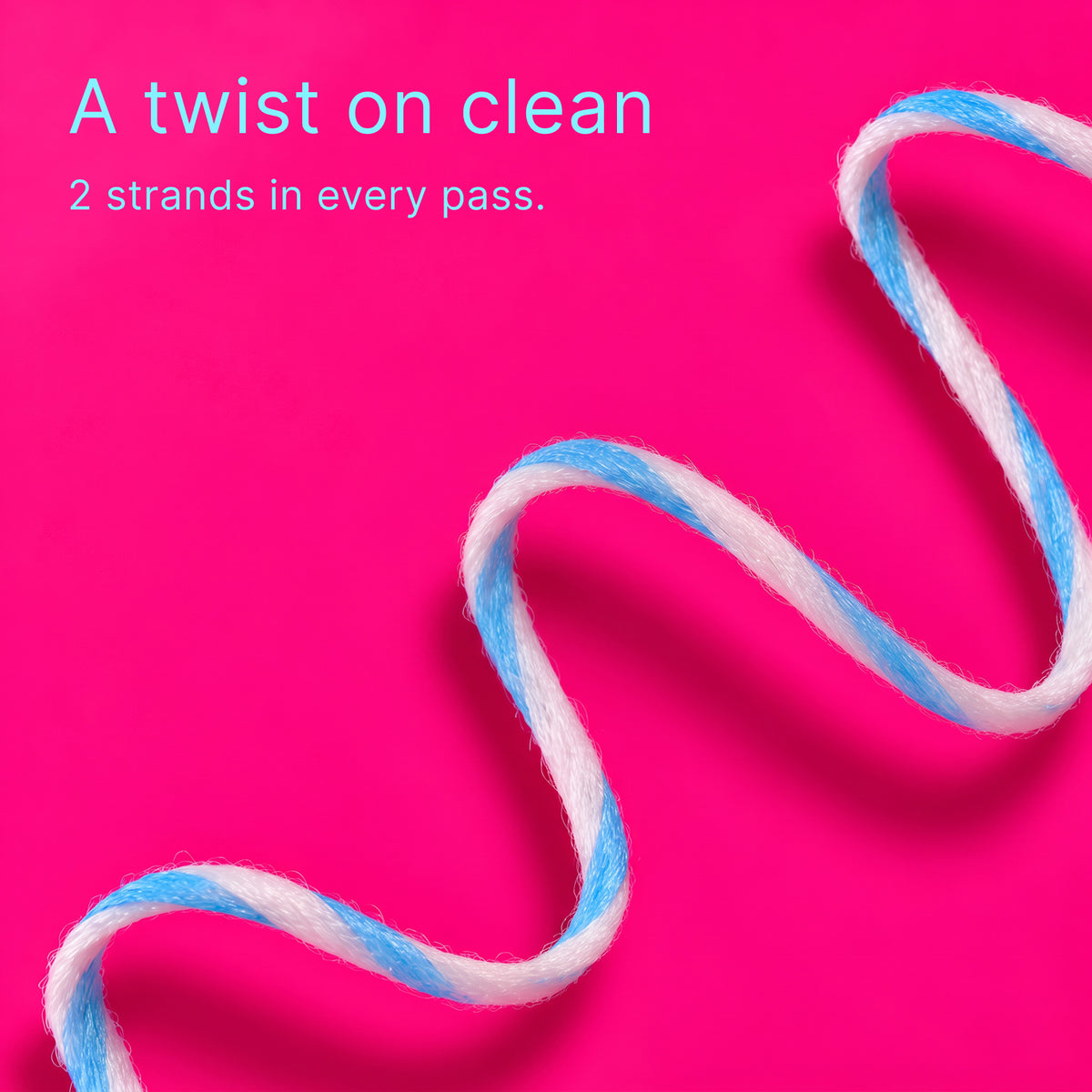 Close-up of blue and white Twist floss: a twist on clean, 2 strands in every pass